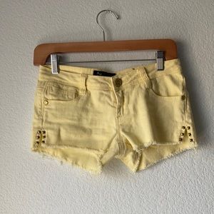 Pale yellow short shorts. Eighty eight size 3.